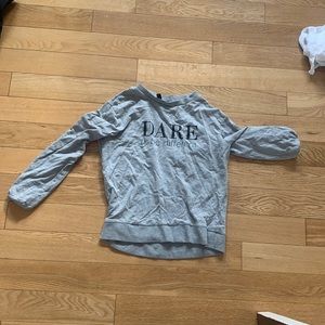 H&M. Shirt with design at front